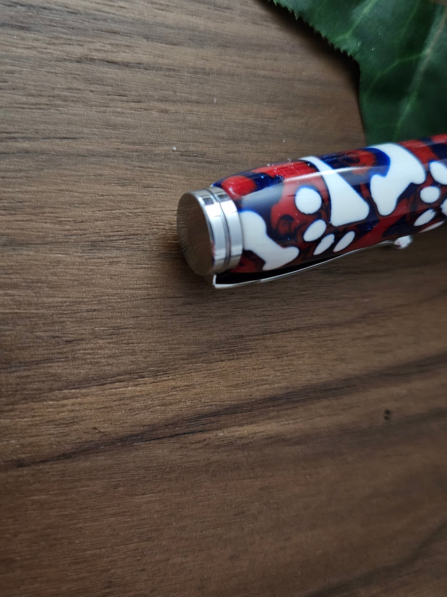 Magnetic Telescoping (Extendable) Pickup Tool Featuring White Dog Bones and Puppy Paws on a Background of Glittery Red and Blue with a Chrome Kit