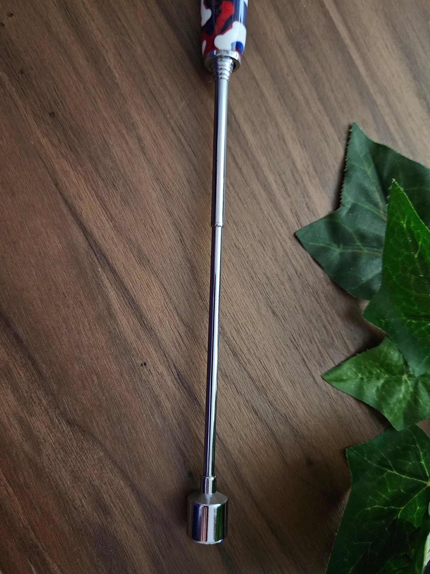 Magnetic Telescoping (Extendable) Pickup Tool Featuring White Dog Bones and Puppy Paws on a Background of Glittery Red and Blue with a Chrome Kit