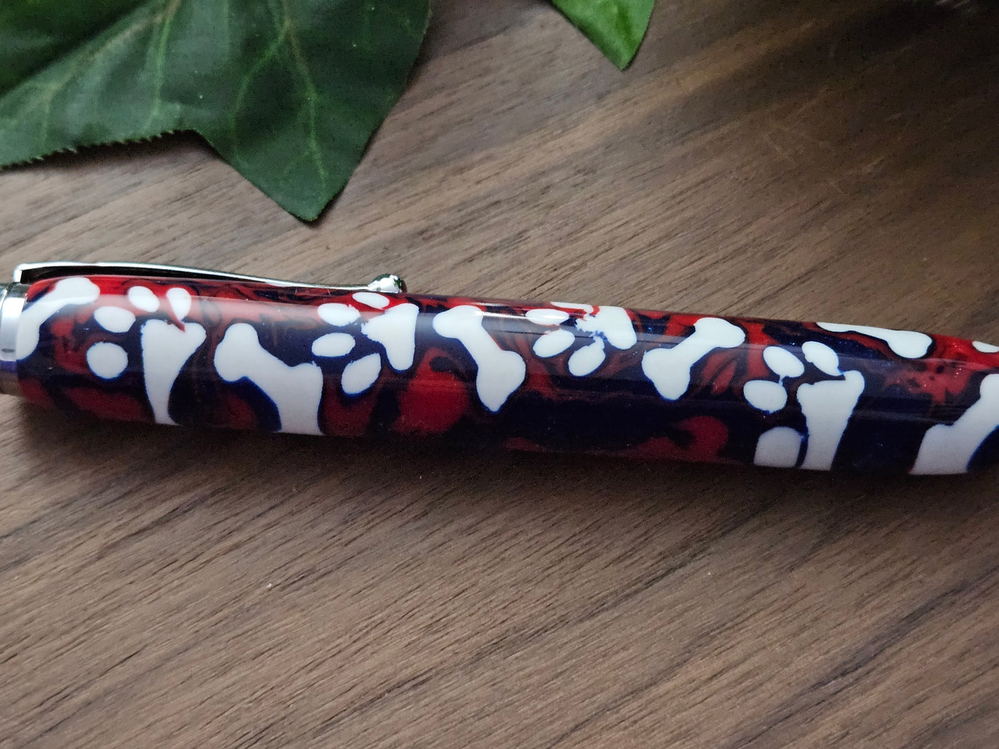 Magnetic Telescoping (Extendable) Pickup Tool Featuring White Dog Bones and Puppy Paws on a Background of Glittery Red and Blue with a Chrome Kit