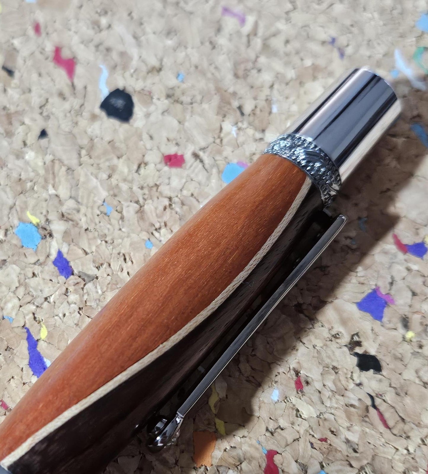 Walnut and Padauk Wooden Pen with a Stripe of Maple and an Elegant Sierra Chrome and Gunmetal Pen Kit with a Zirconium Gem on the Clip