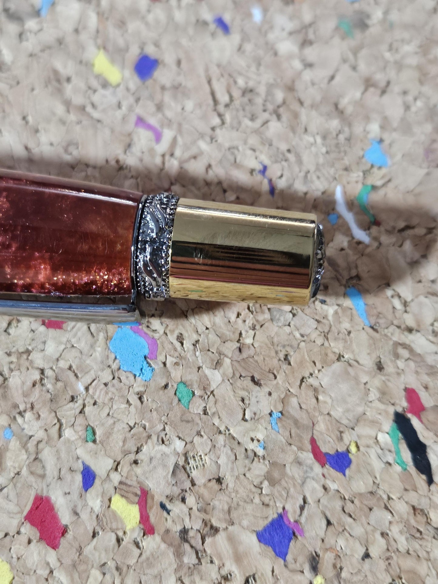 Red Swirled Resin Pen with Glitter and a Majestic Squire Inspired Gold Titanium and Rhodium Pen Kit with a Zirconium Gem on the Clip
