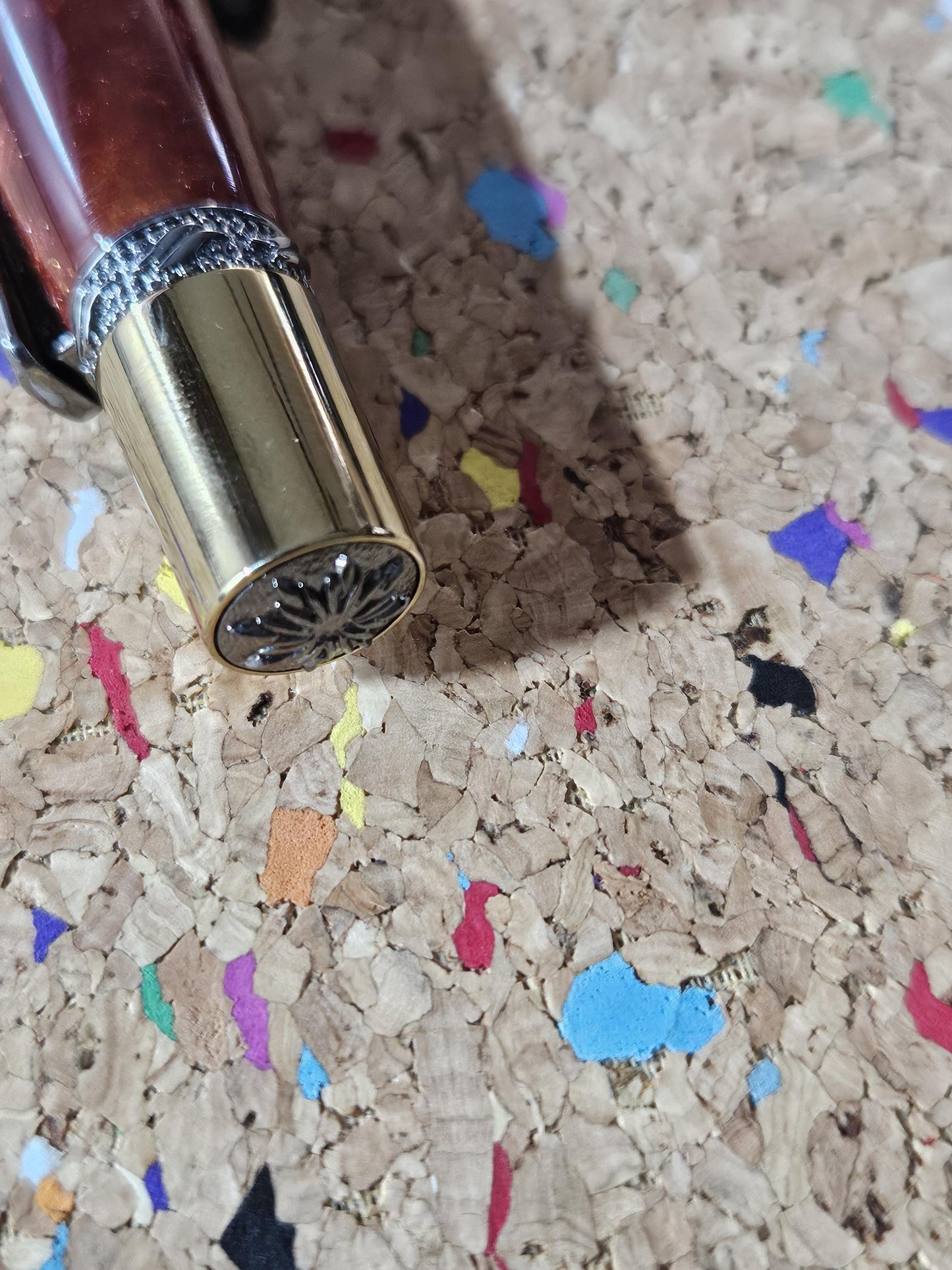 Red Swirled Resin Pen with Glitter and a Majestic Squire Inspired Gold Titanium and Rhodium Pen Kit with a Zirconium Gem on the Clip