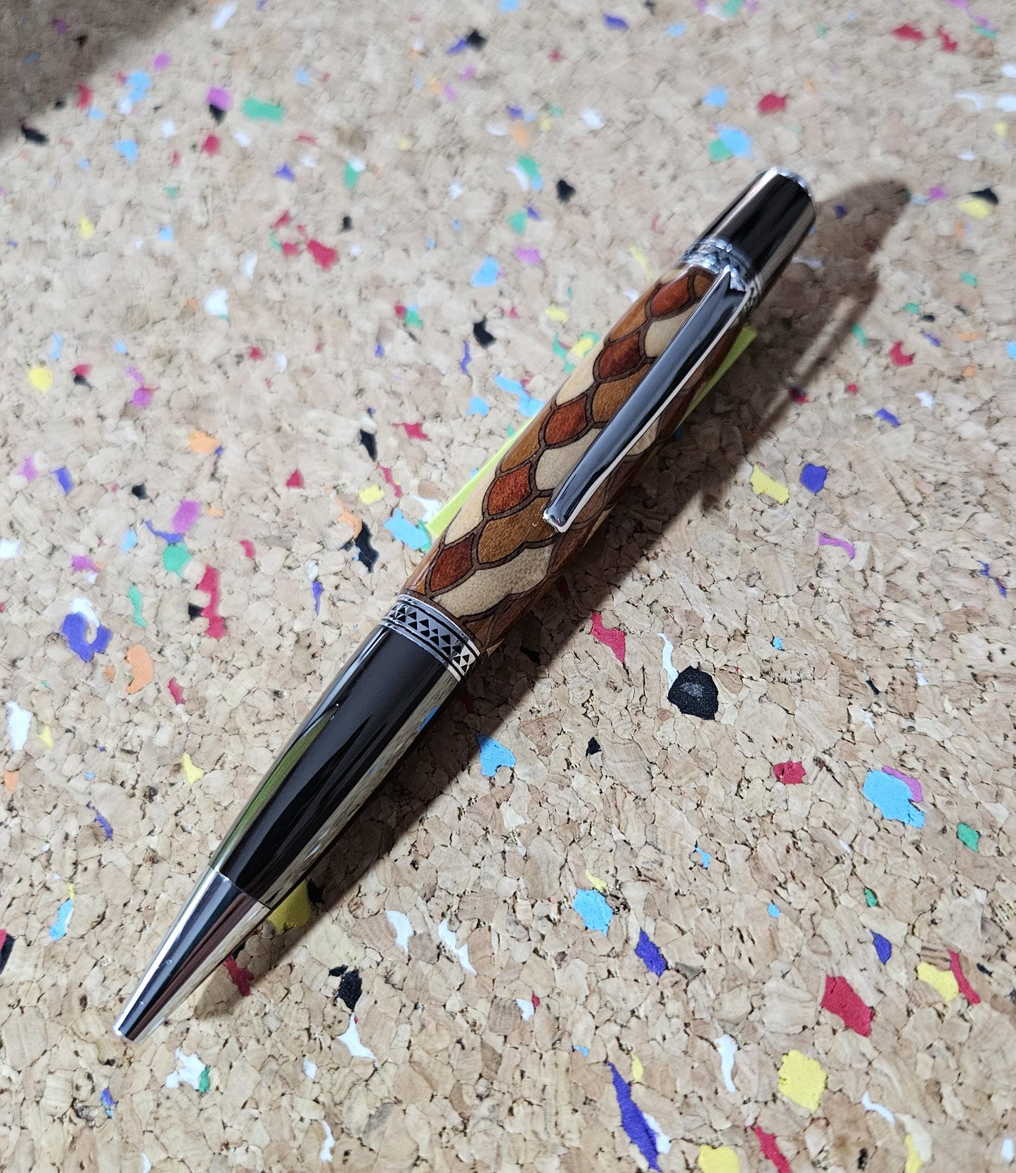Cobb Brothers Scalloped Wooden Inlay Pen using Padauk, Mahogany, Maple, and Walnut Woods and Adorned with a Gunmetal and Chrome Pen Kit