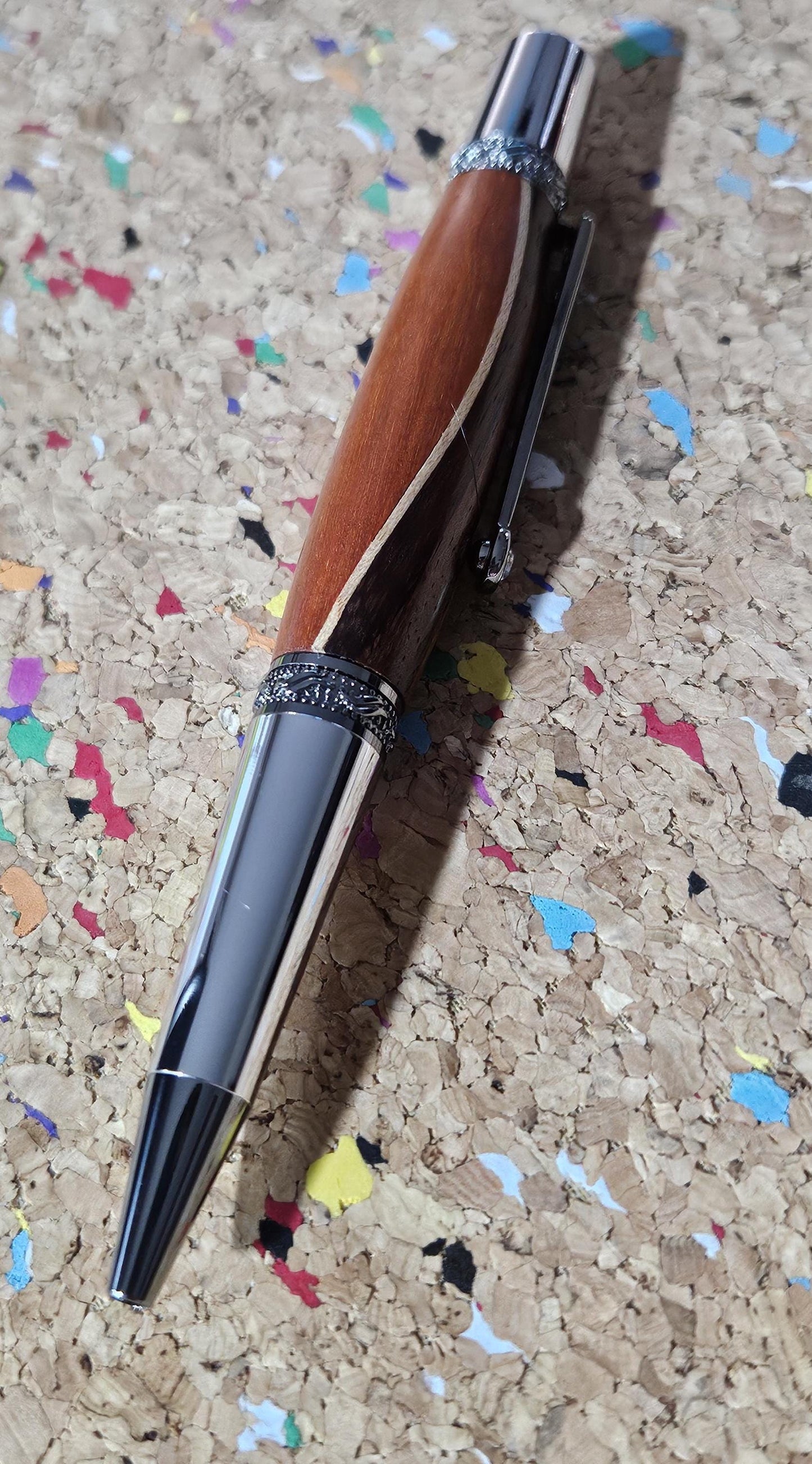 Walnut and Padauk Wooden Pen with a Stripe of Maple and an Elegant Sierra Chrome and Gunmetal Pen Kit with a Zirconium Gem on the Clip