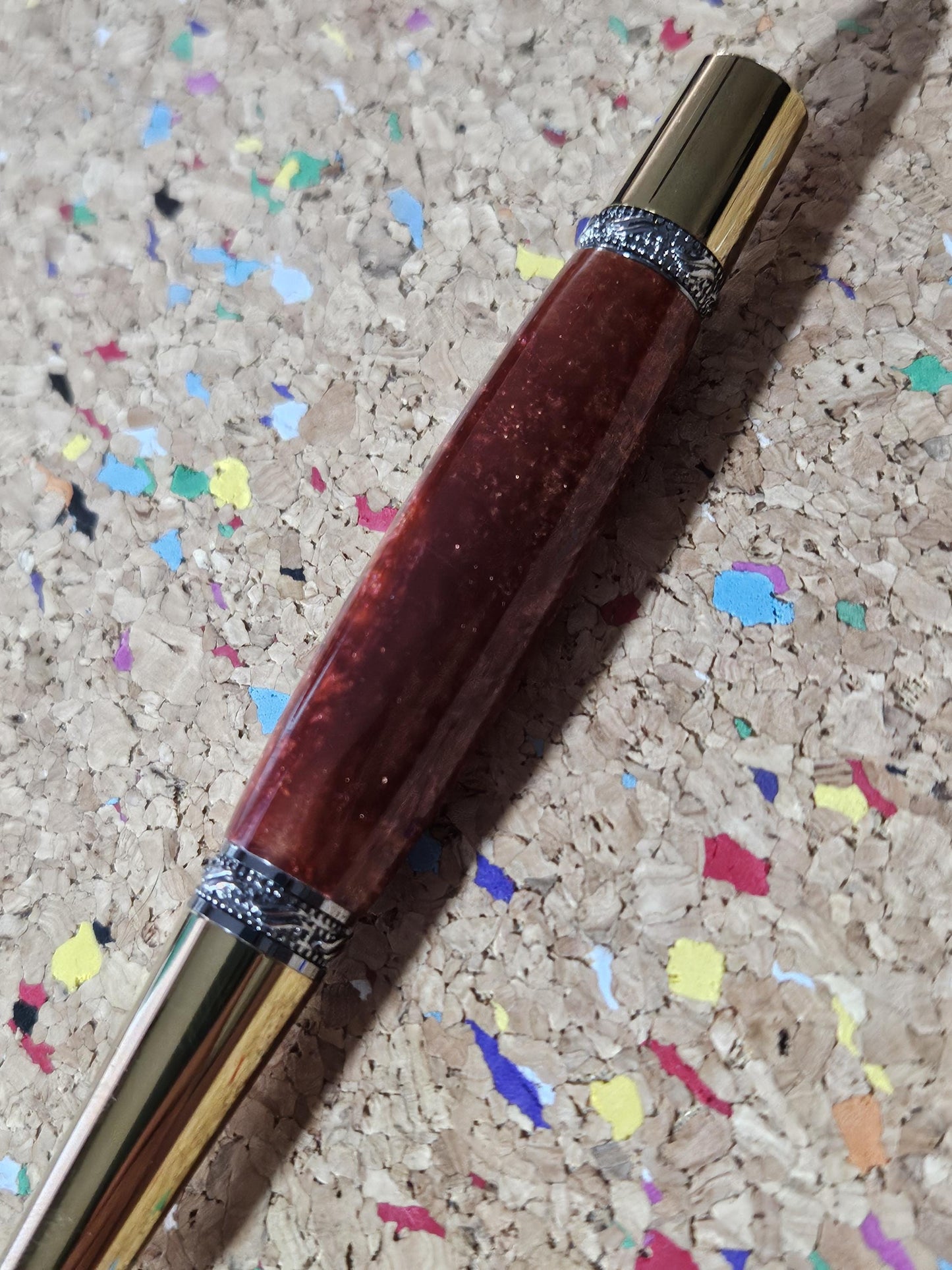 Red Swirled Resin Pen with Glitter and a Majestic Squire Inspired Gold Titanium and Rhodium Pen Kit with a Zirconium Gem on the Clip