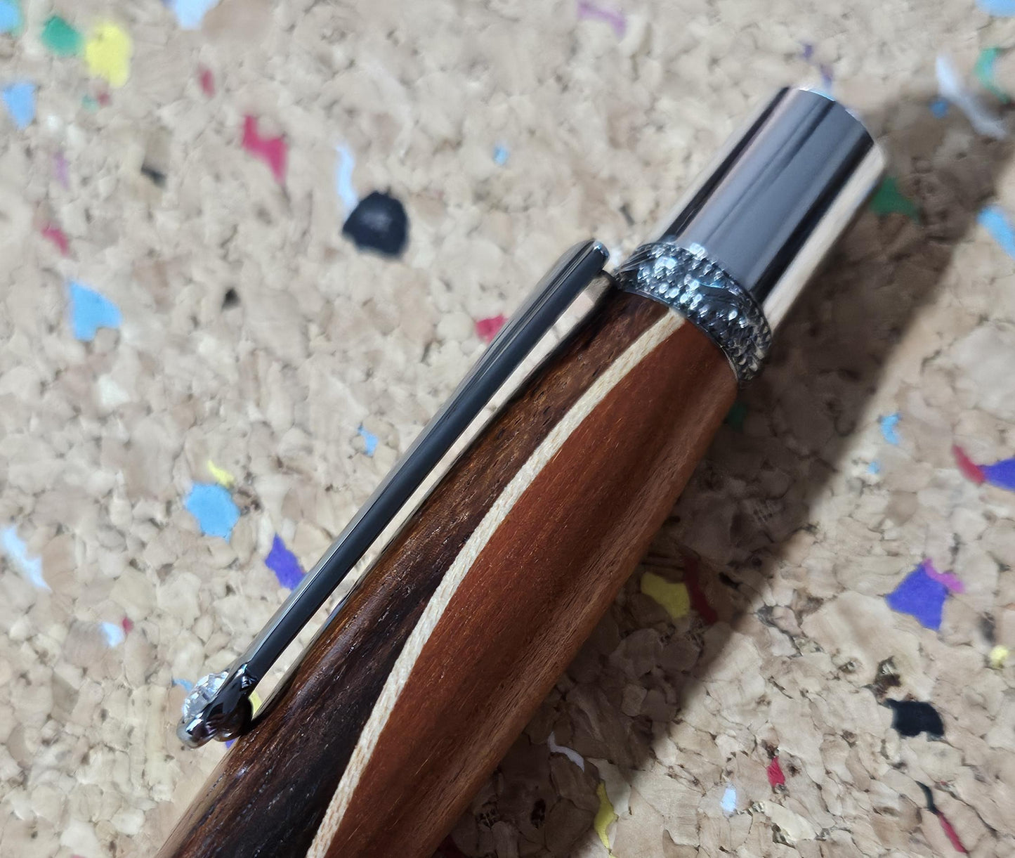 Walnut and Padauk Wooden Pen with a Stripe of Maple and an Elegant Sierra Chrome and Gunmetal Pen Kit with a Zirconium Gem on the Clip