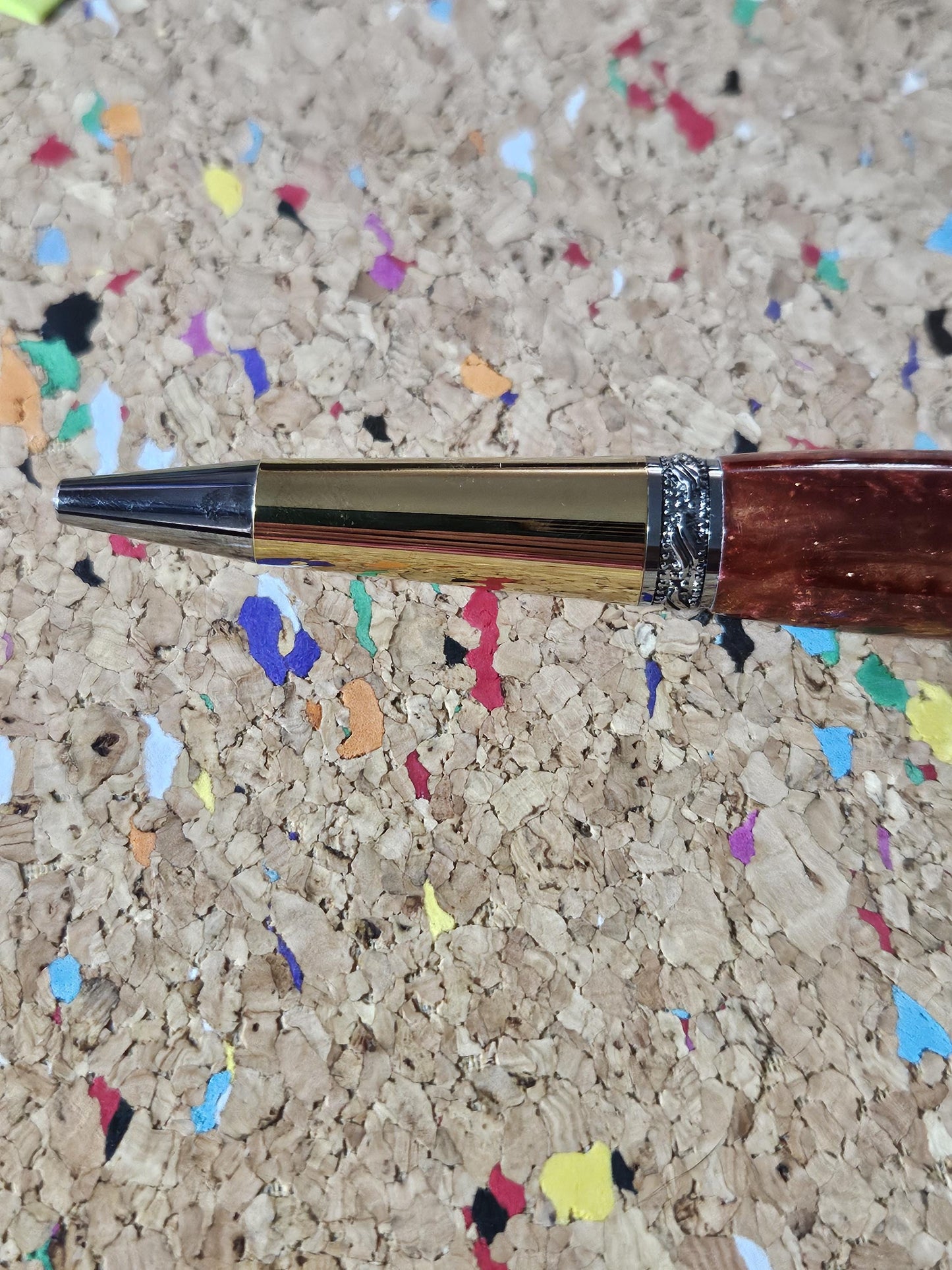 Red Swirled Resin Pen with Glitter and a Majestic Squire Inspired Gold Titanium and Rhodium Pen Kit with a Zirconium Gem on the Clip