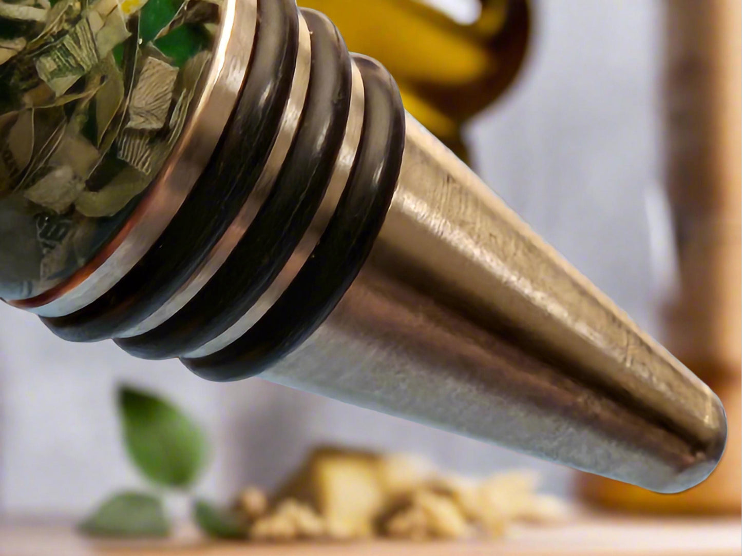 Bottle Stopper with Shredded Money Cast in Clear Resin with a Stainless Steel Bottle Stopper