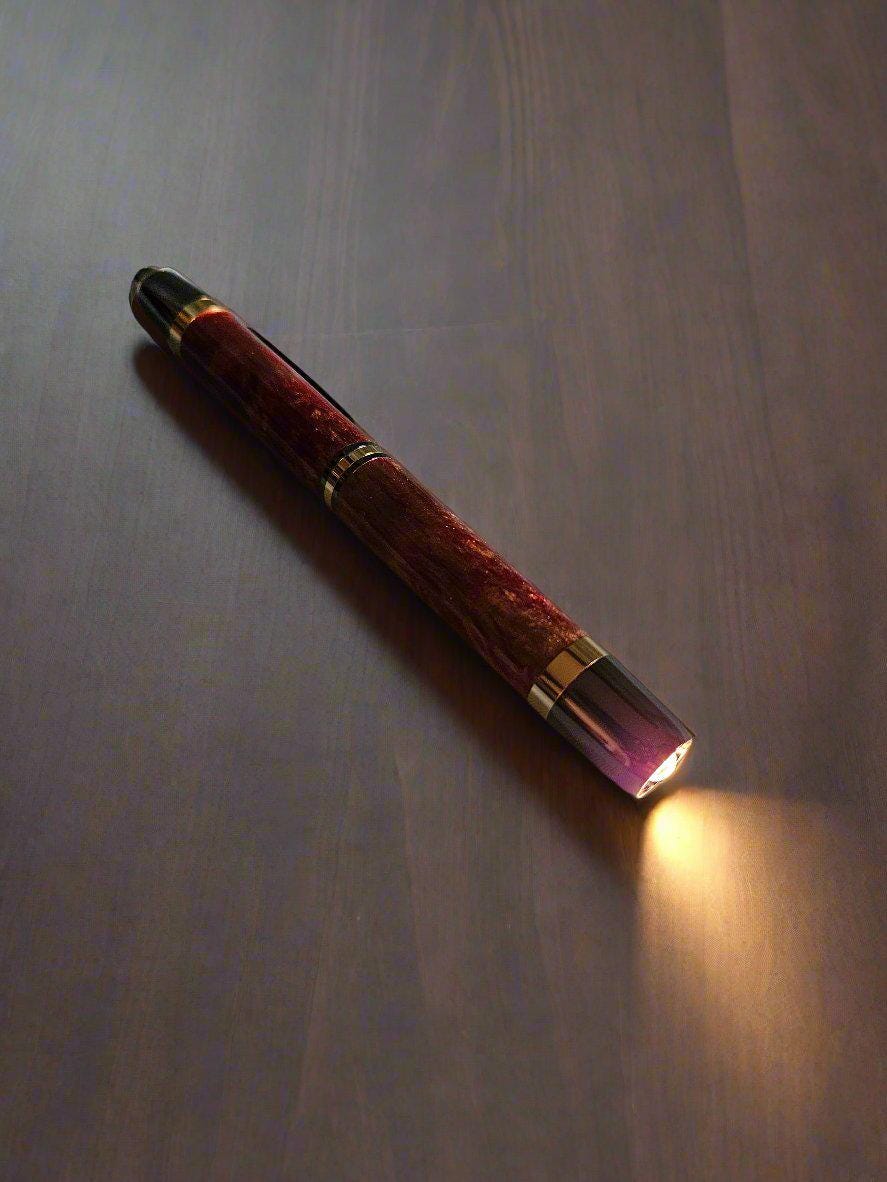 Penlight - LED Diamond Cast Red, Gold, and Brown Glittery Swirl Penlight with a Gunmetal Kit and Gold Accents