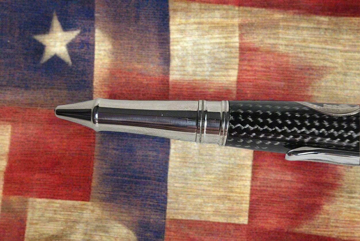 Texas Twist Black Carbon Fiber Sleeve Pen Proudly Displaying the Texas Star with a Chrome Pen Kit