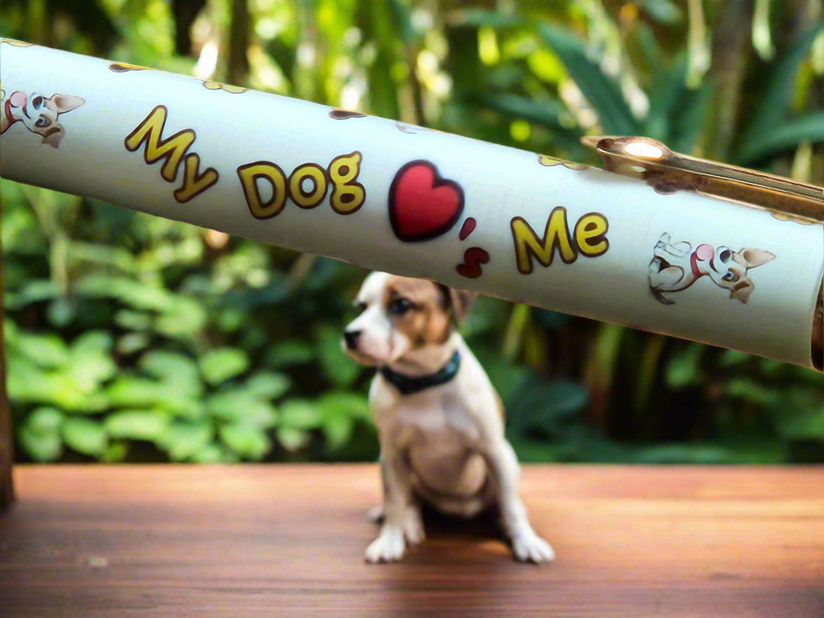My Dog Loves Me Pen with a Gold Click Top Featuring a Dog Bone, a Dog Bowl, and Doggie Paw Prints