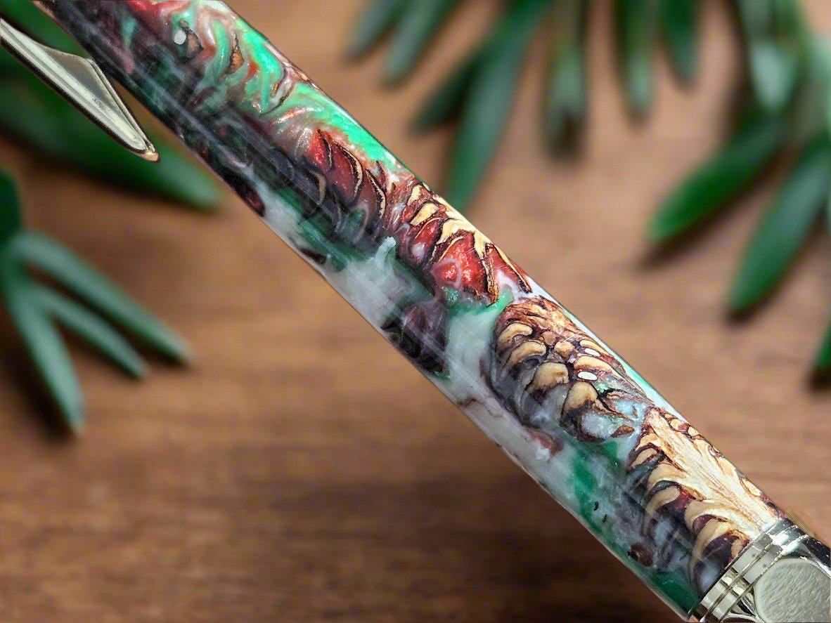 Christmas Colors Hexagonal Vertex Click Pen with Pinecones Swirled in Holiday Resin and Accompanied by a Gold Pen Kit
