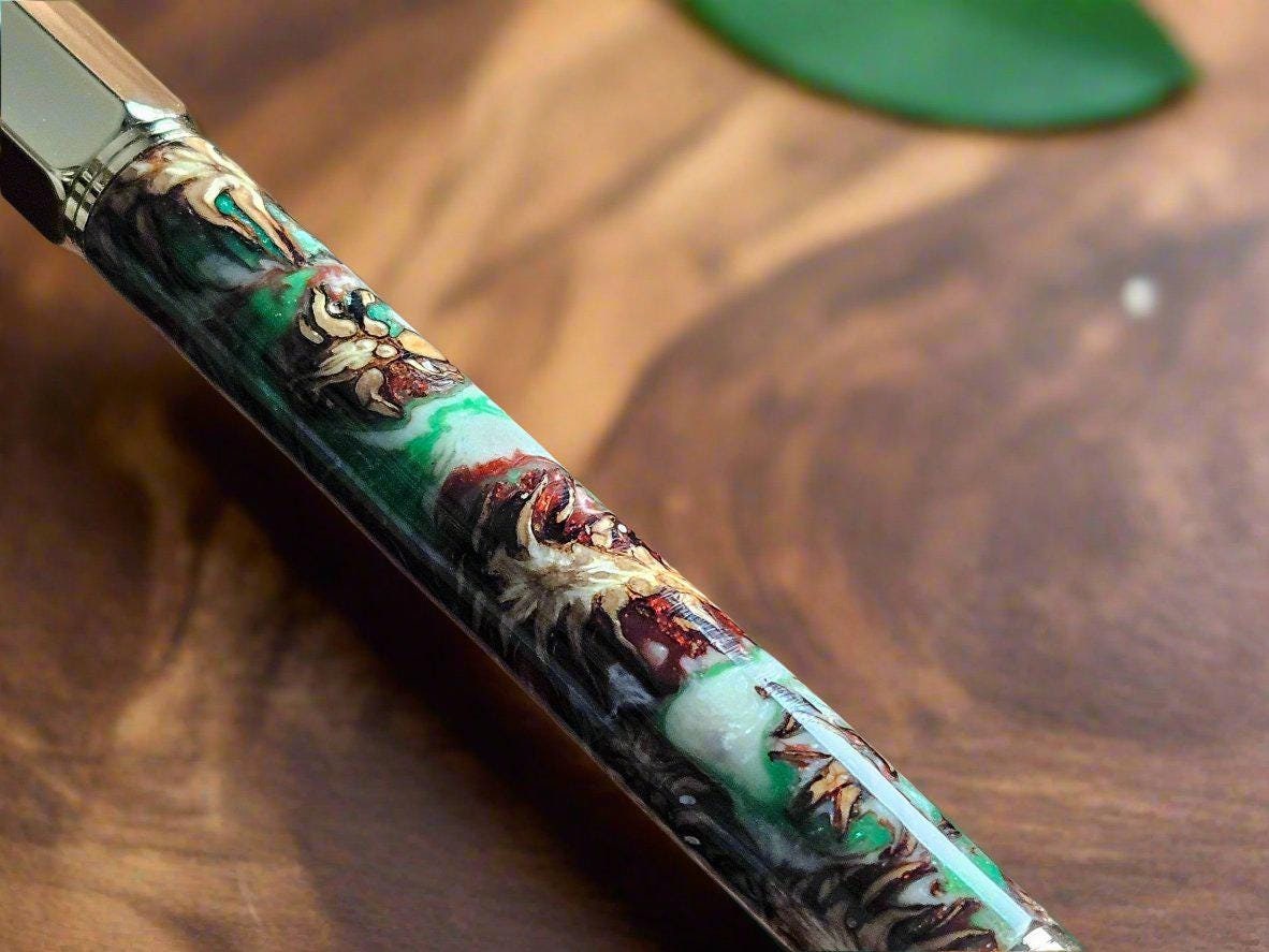 Christmas Colors Hexagonal Vertex Click Pen with Pinecones Swirled in Holiday Resin and Accompanied by a Gold Pen Kit