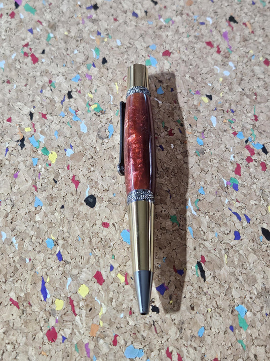 Red Swirled Resin Pen with Glitter and a Majestic Squire Inspired Gold Titanium and Rhodium Pen Kit with a Zirconium Gem on the Clip