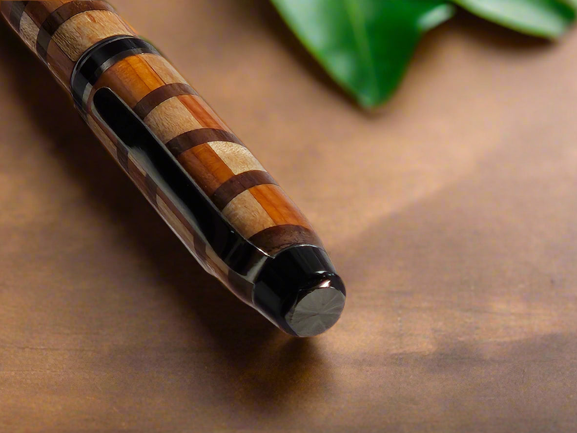 Segmented Wooden Pen, handcrafted from Cherry, Maple, and Walnut with a Gunmetal Pen Kit and Sleek Black Accents