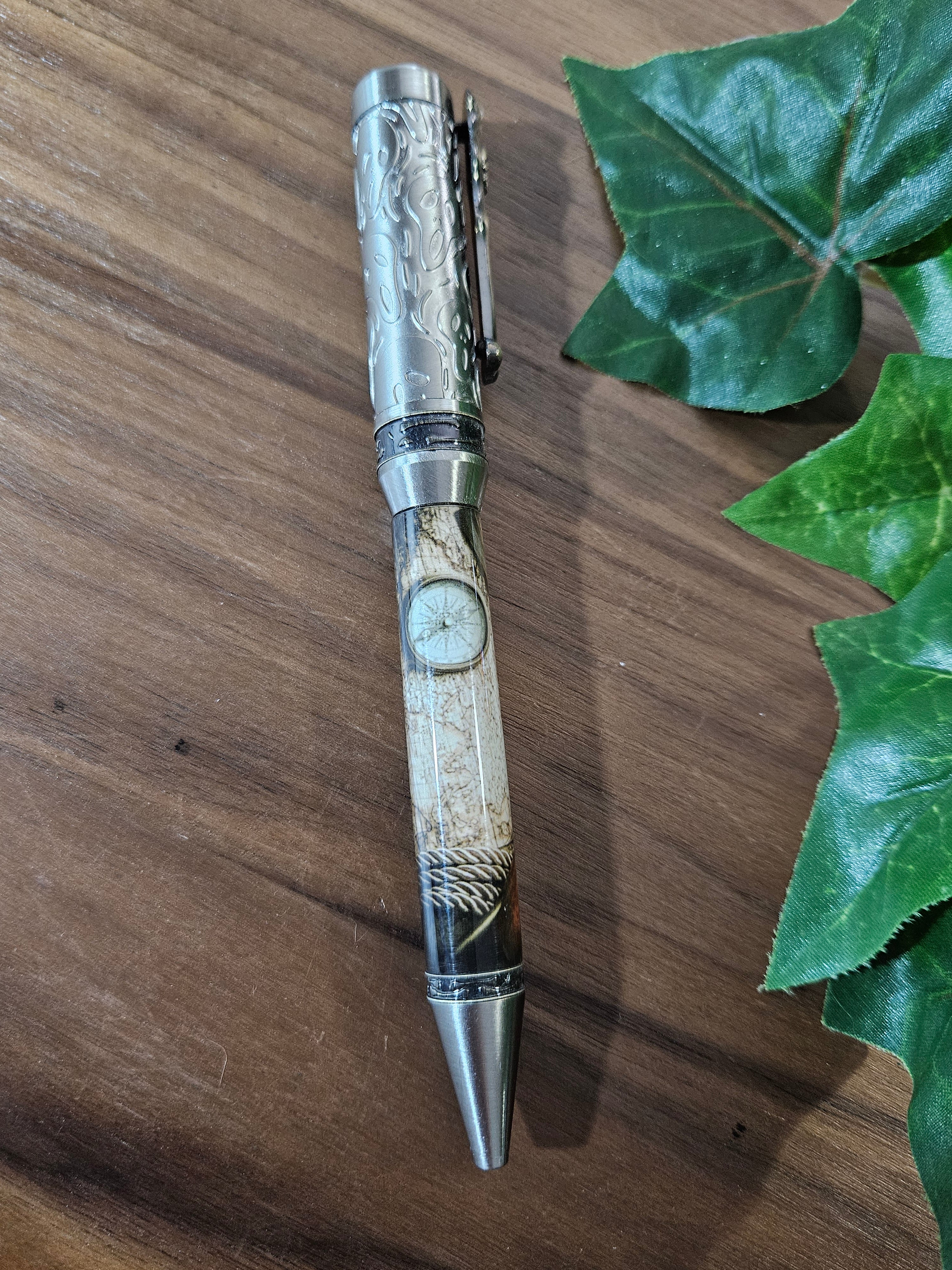 Pirate Map on a Navigation Table with a Compass Label Cast Pen with Sliver Pirate, Ghost, and Skulls Pen Kit with Antique Bronze Accents