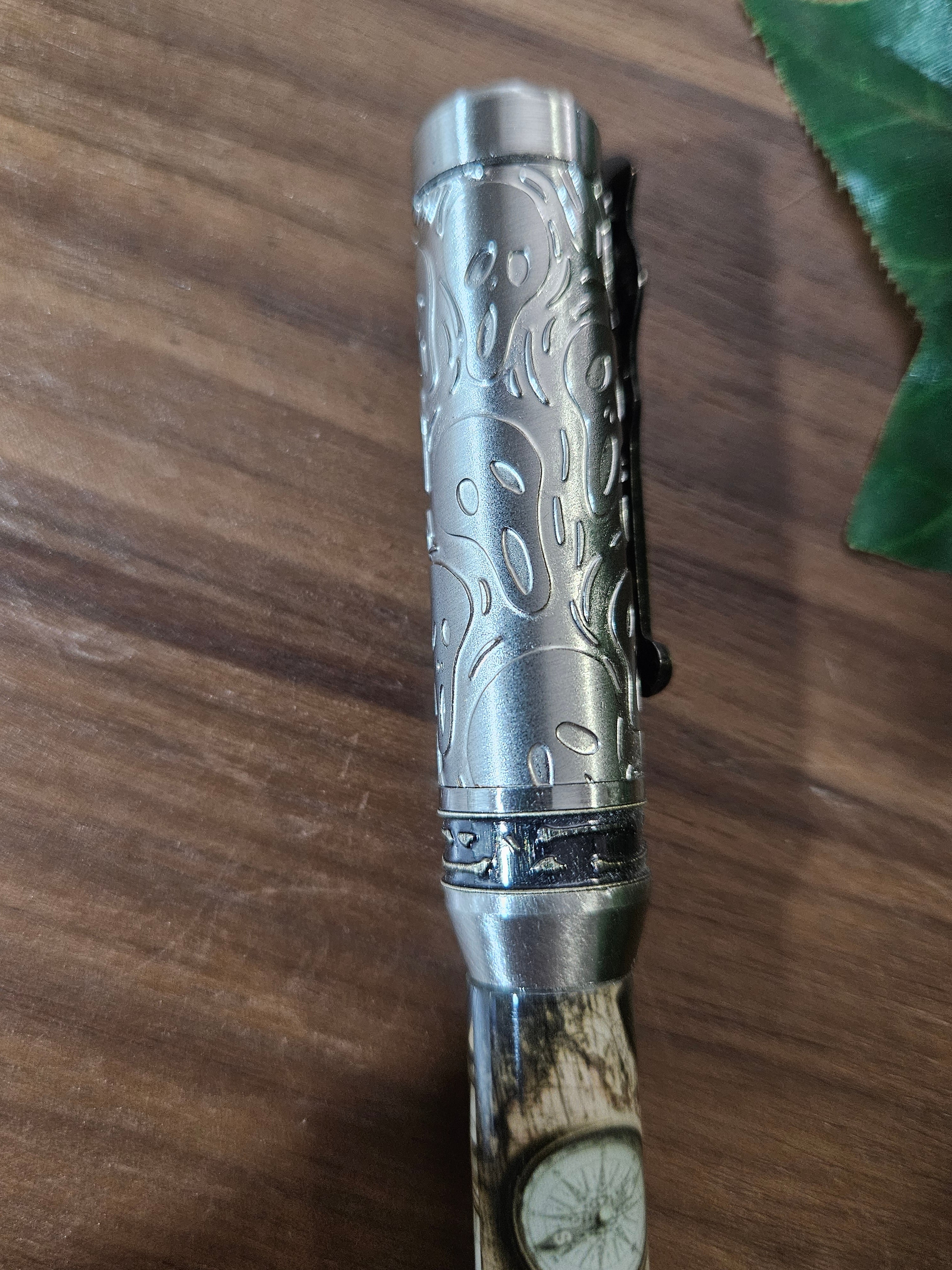 Pirate Map on a Navigation Table with a Compass Label Cast Pen with Sliver Pirate, Ghost, and Skulls Pen Kit with Antique Bronze Accents