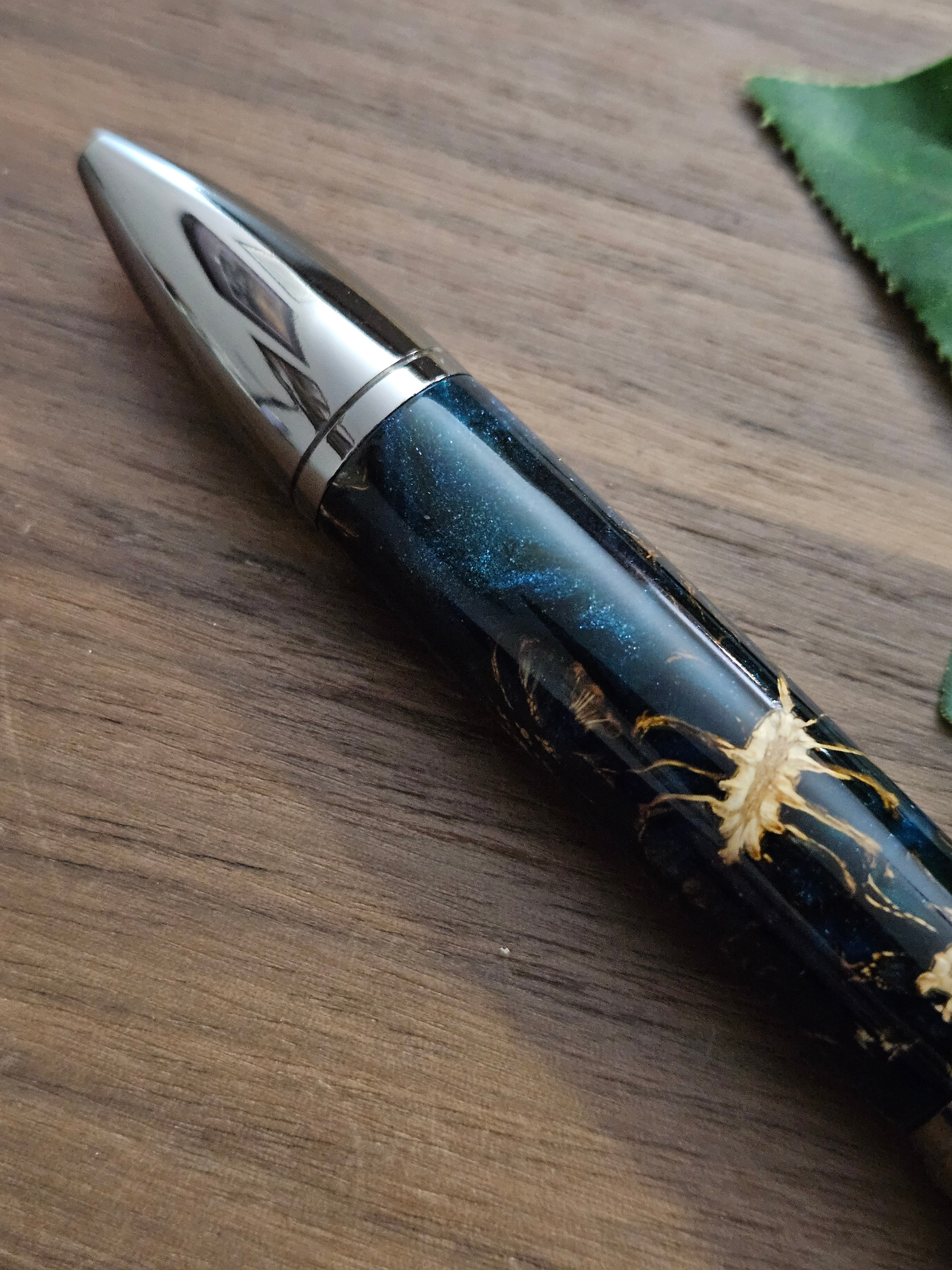 Hybrid Metier Twist Ballpoint Pen with a Red Laser Pointer, Dark Blue Resin, and Pinecone Embeds with a Gunmetal Finish