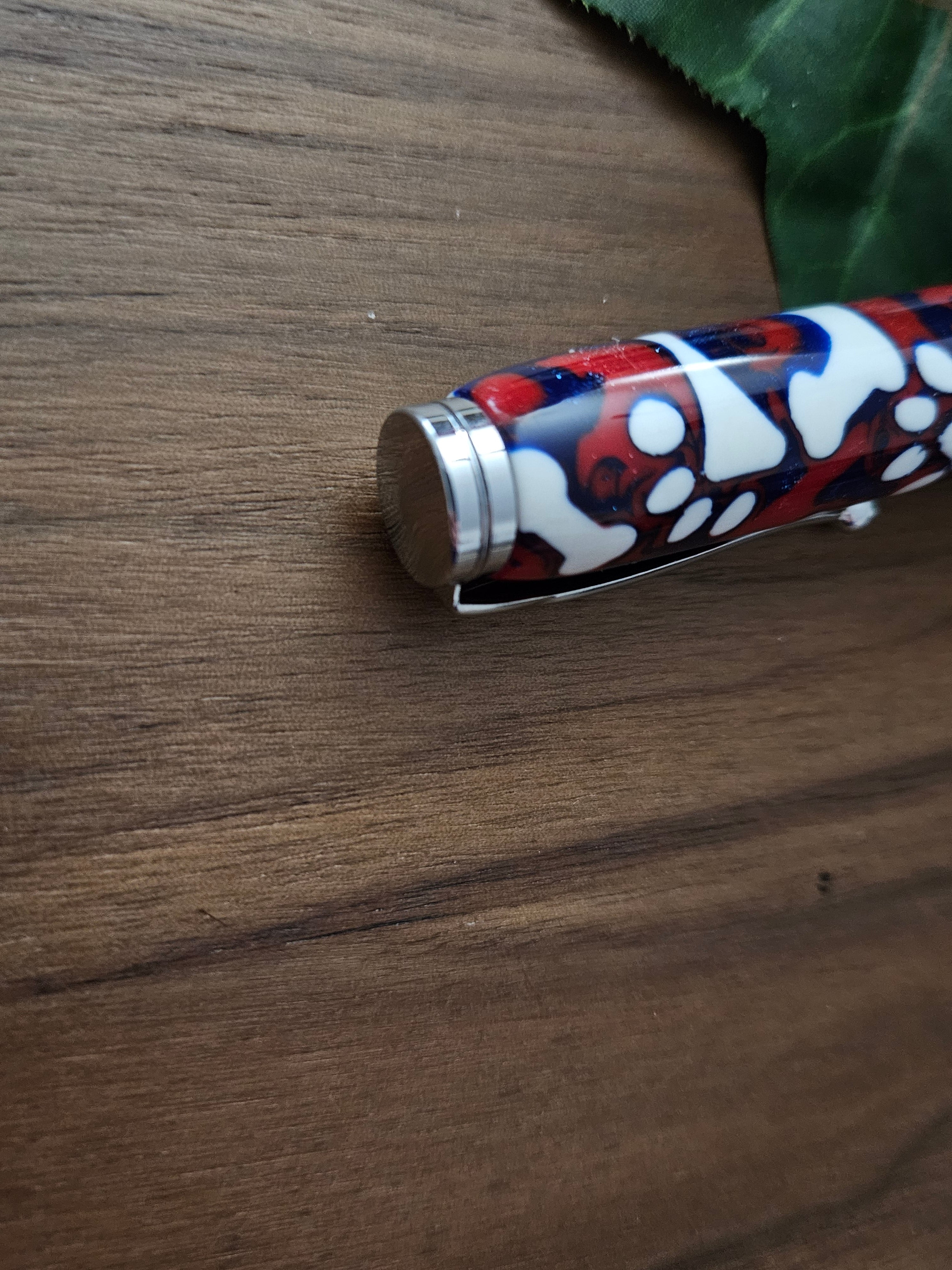 Magnetic Telescoping (Extendable) Pickup Tool Featuring White Dog Bones and Puppy Paws on a Background of Glittery Red and Blue with a Chrome Kit