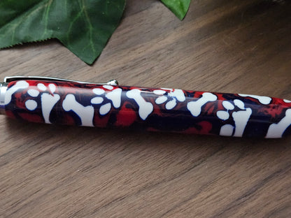 Magnetic Telescoping (Extendable) Pickup Tool Featuring White Dog Bones and Puppy Paws on a Background of Glittery Red and Blue with a Chrome Kit