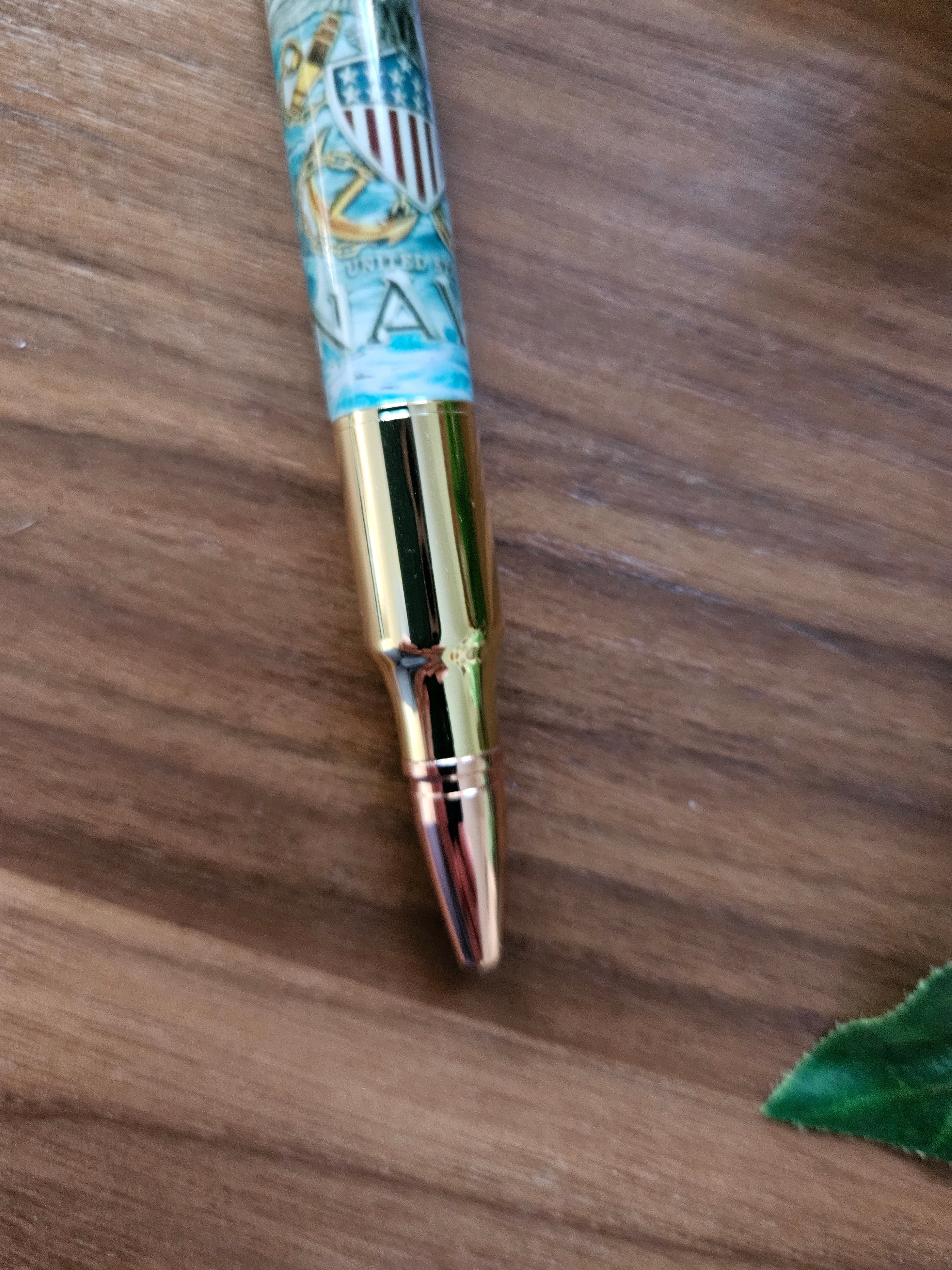 The Sea is Ours - Navy Emblem Label Cast Pen - Teal Background with a Gold Pen Kit Featuring a Rifle Pen Clip