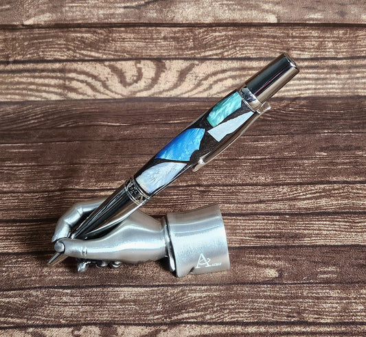 Pearlized Chips of Resin: Blue, Green, White, and Violet Contrasting with a Black Base and a Black Titanium and Chrome Pen Kit
