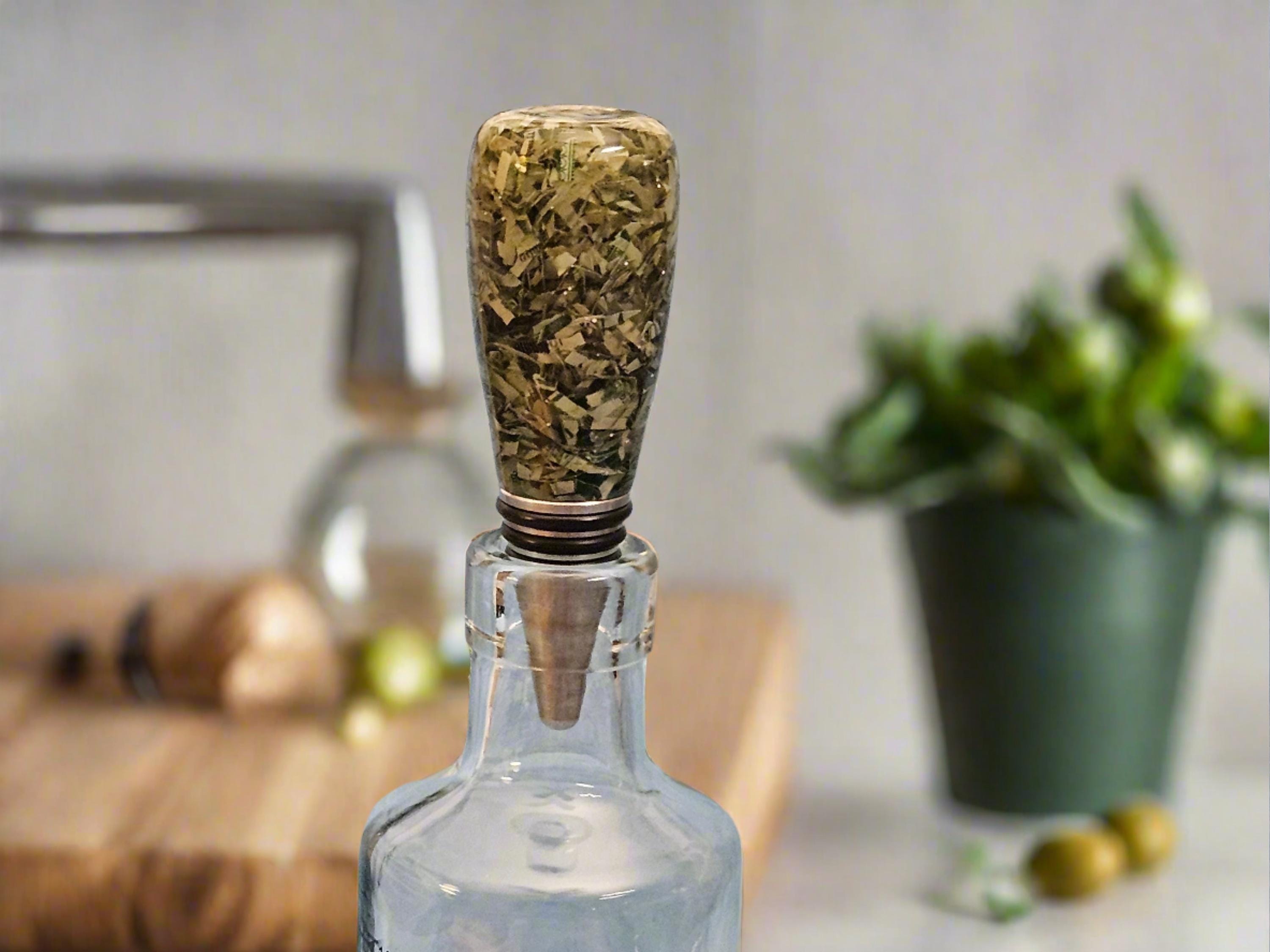 Bottle Stopper with Recycled Shredded Money Cast in Clear Resin and a Stainless Steel Food Safe Bottle Stopper