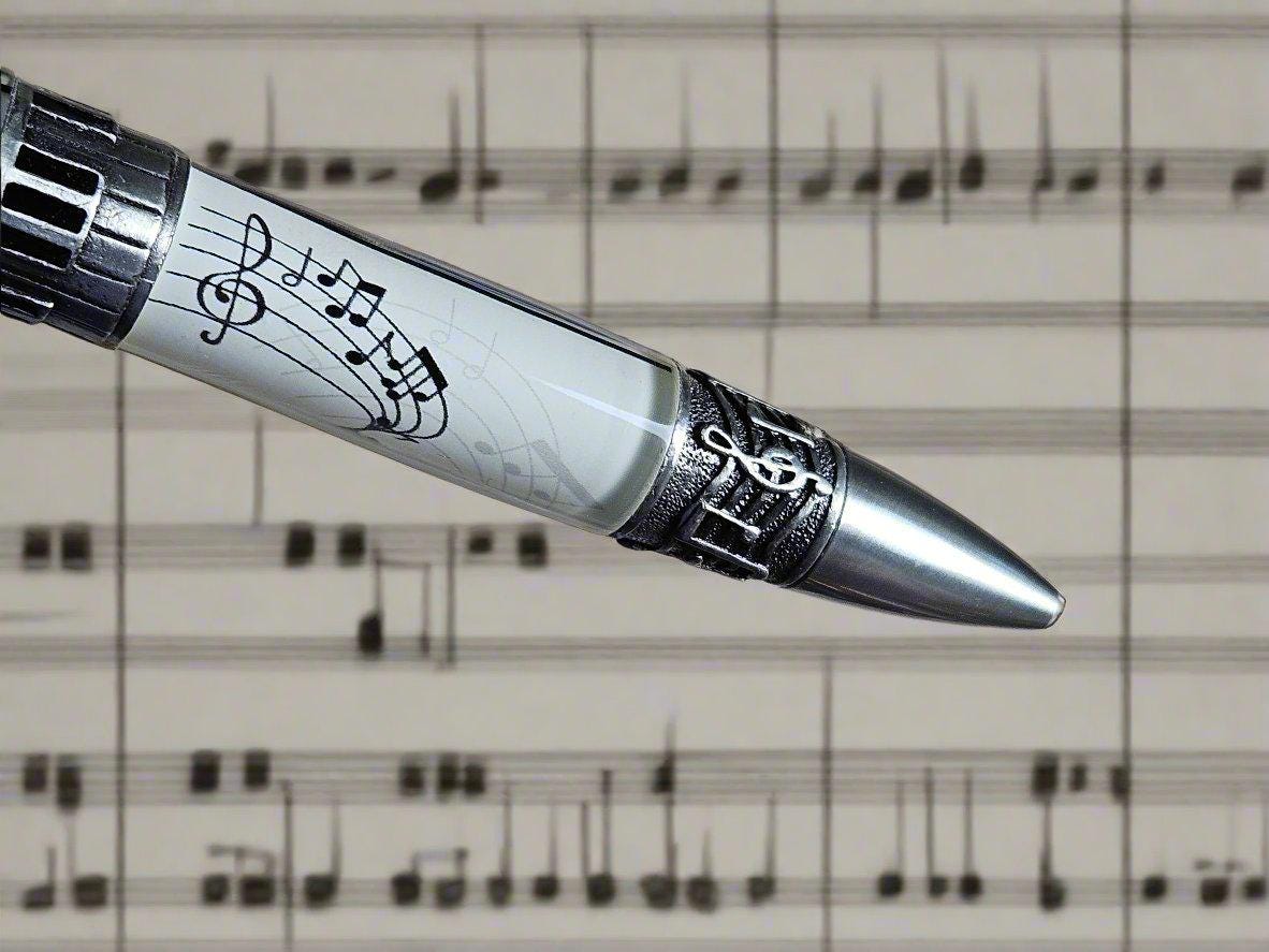 Musical Instruments Pen (piano, drums, guitar represented) with an Antique Pewter Pen Kit and a White Music Sheet Label Cast on the Body