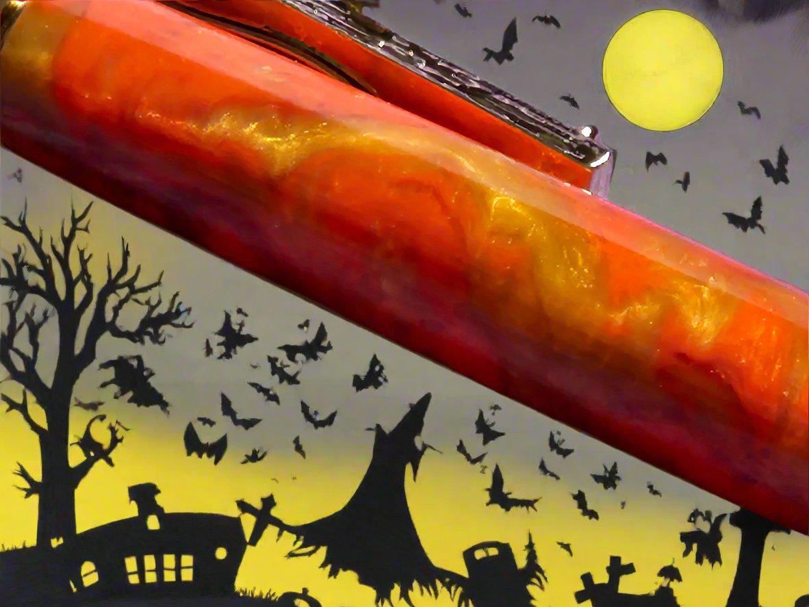 Haunted Halloween Orange and Gold Resin Swirled Pen with a Gold Halloween Pen Kit Featuring a Mummy, a Zombie, and a Jack-O-Lantern