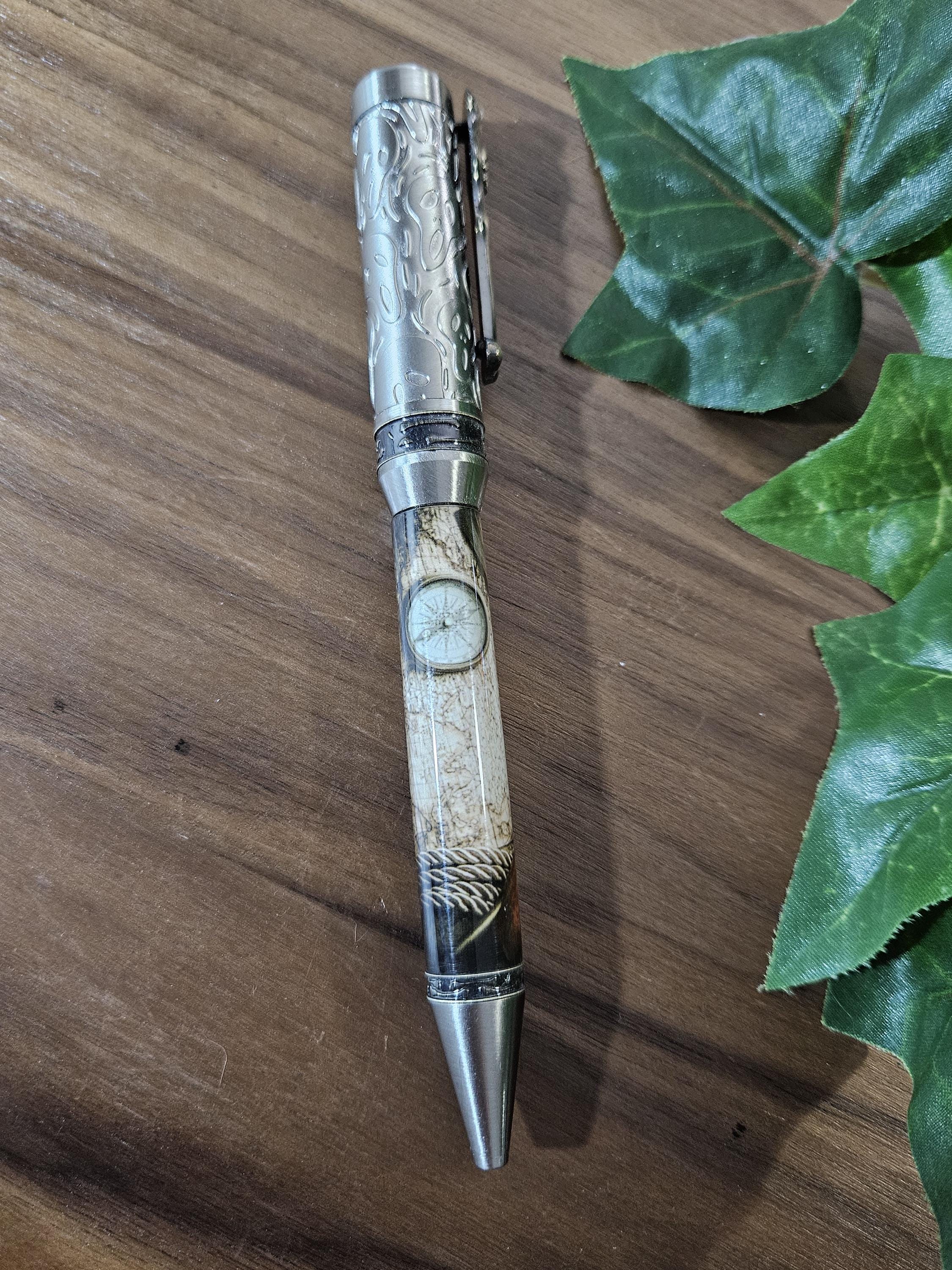Pirate Map on a Navigation Table with a Compass Label Cast Pen with Sliver Pirate, Ghost, and Skulls Pen Kit with Antique Bronze Accents