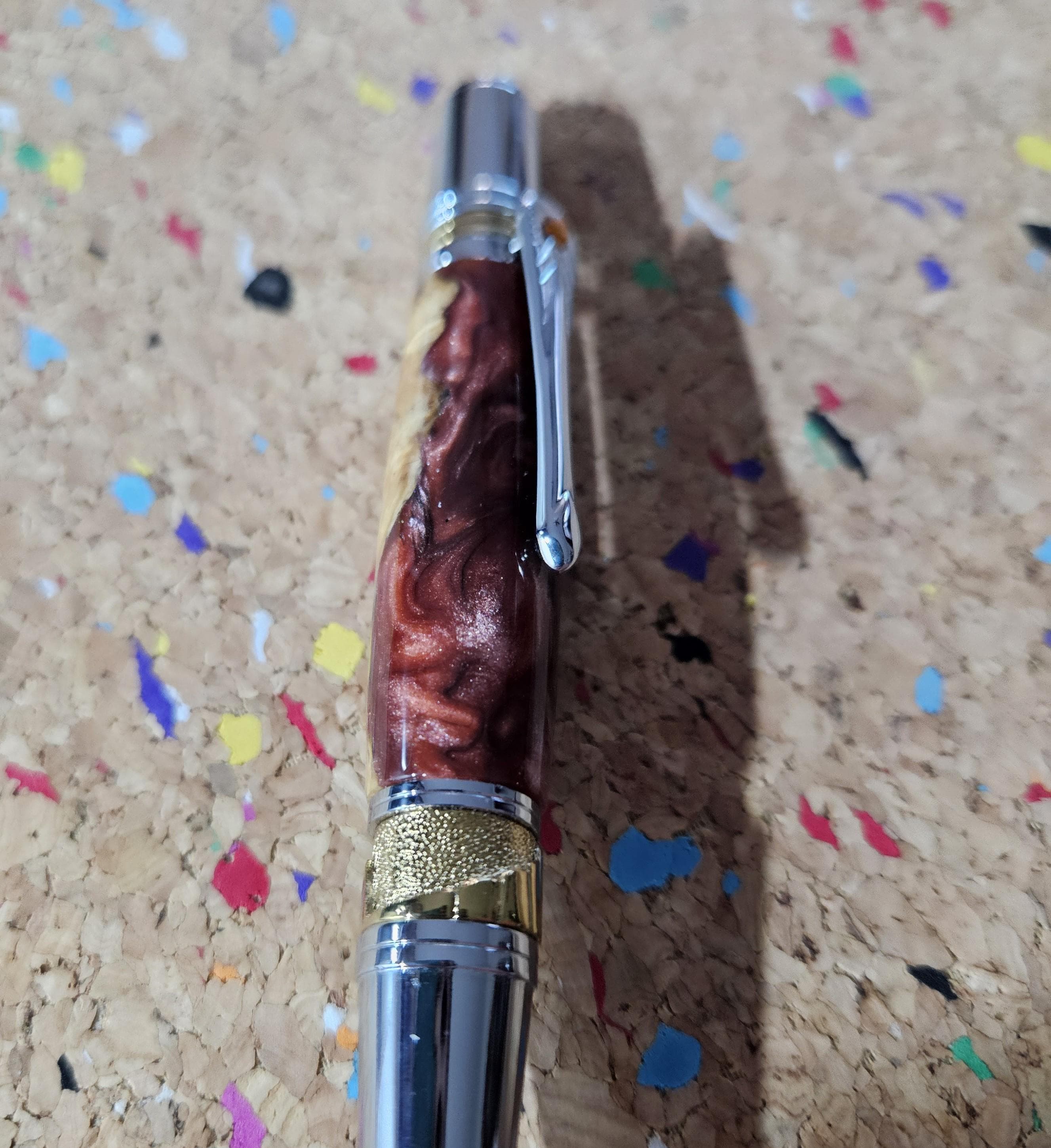 Maple Burl Wooden Pen Hybrid with Mixed Red Resin and Glitter and a Titanium Chrome and Gold Art Deco Pen Kit