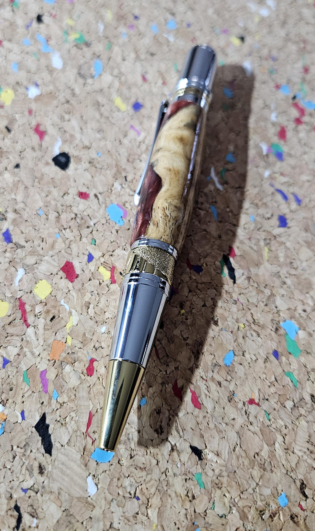 Maple Burl Wooden Pen Hybrid with Mixed Red Resin and Glitter and a Titanium Chrome and Gold Art Deco Pen Kit
