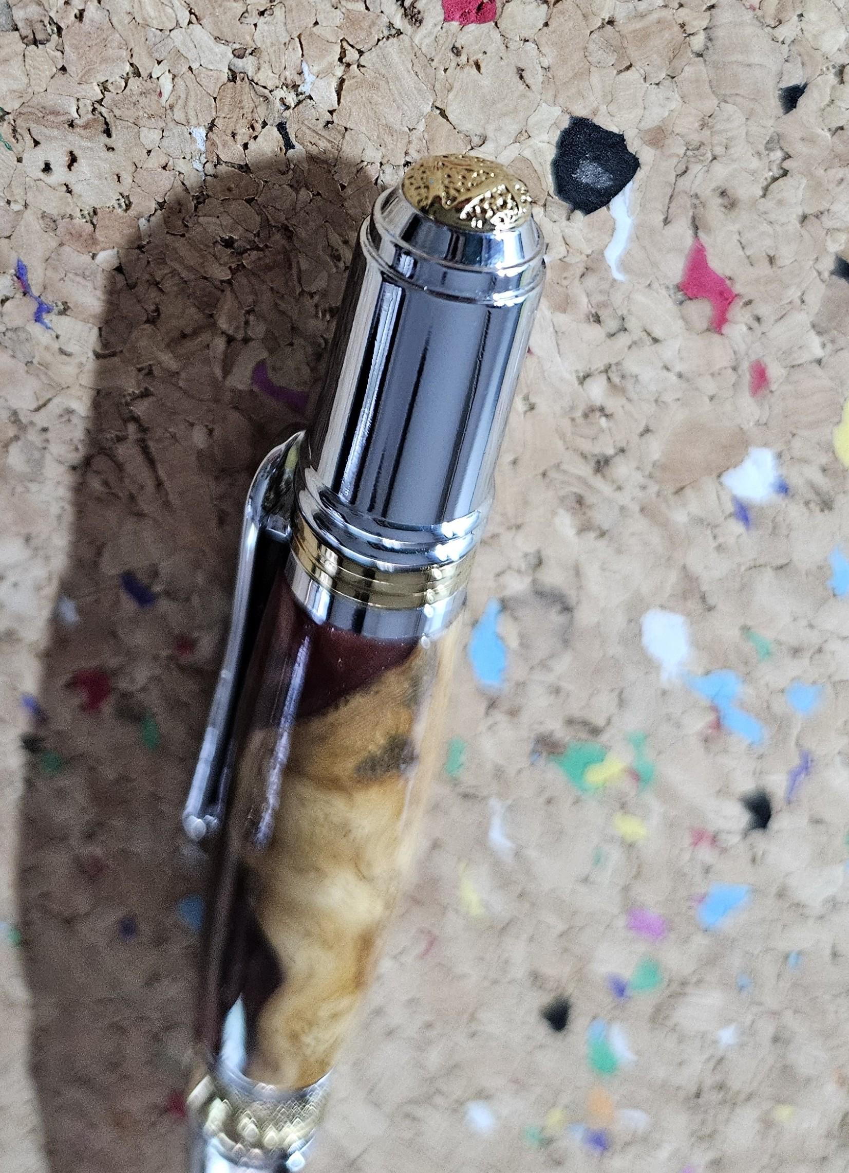 Maple Burl Wooden Pen Hybrid with Mixed Red Resin and Glitter and a Titanium Chrome and Gold Art Deco Pen Kit