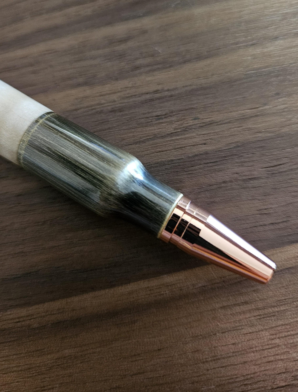 Wooden Bobcat Decal Pen on Curly Maple with a Brushed Antique Brass Bolt Action Rifle Pen Kit