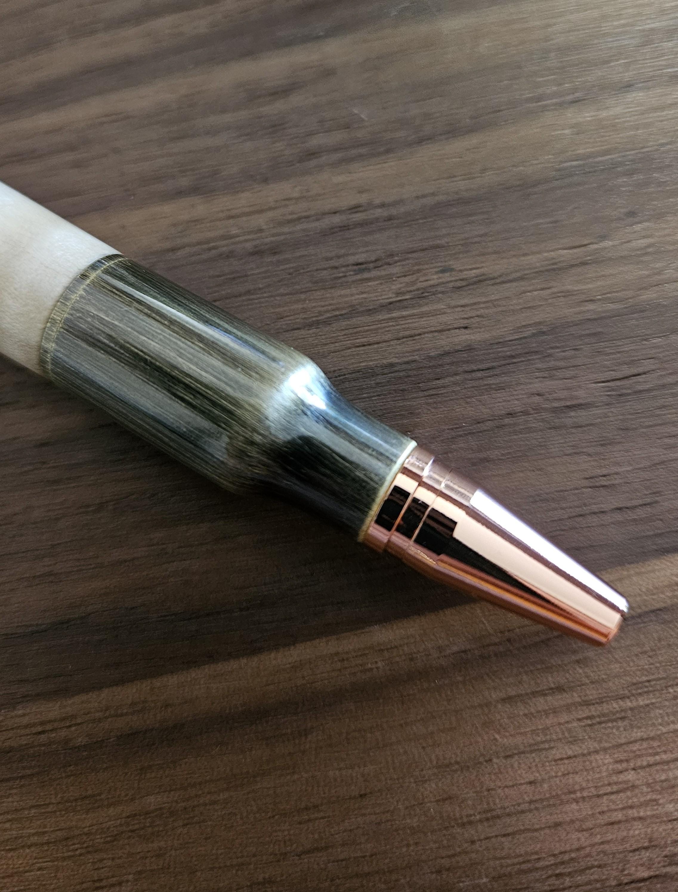 Wooden Bobcat Decal Pen on Curly Maple with a Brushed Antique Brass Bolt Action Rifle Pen Kit