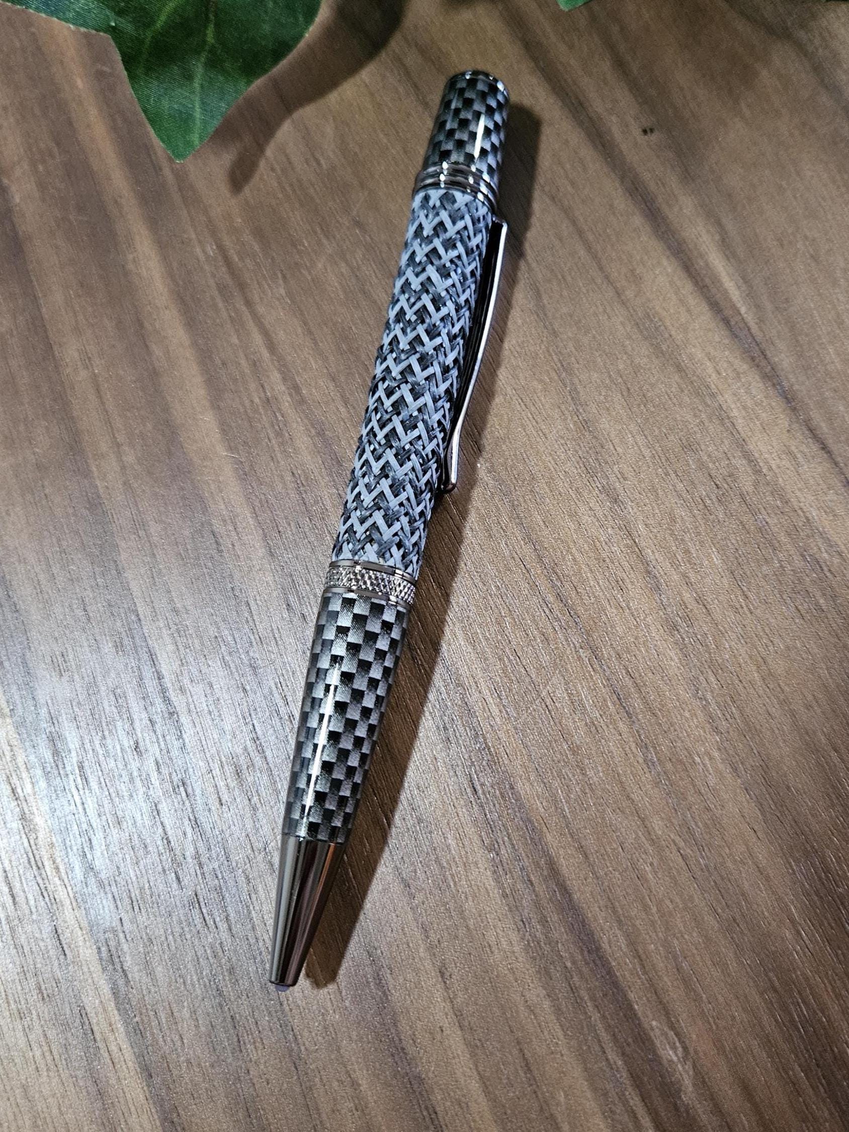 Multi-Colored True Feel Carbon Fiber Twist Pen with Faux Carbon Fiber Finial and Tapered Grip with Gunmetal Accents