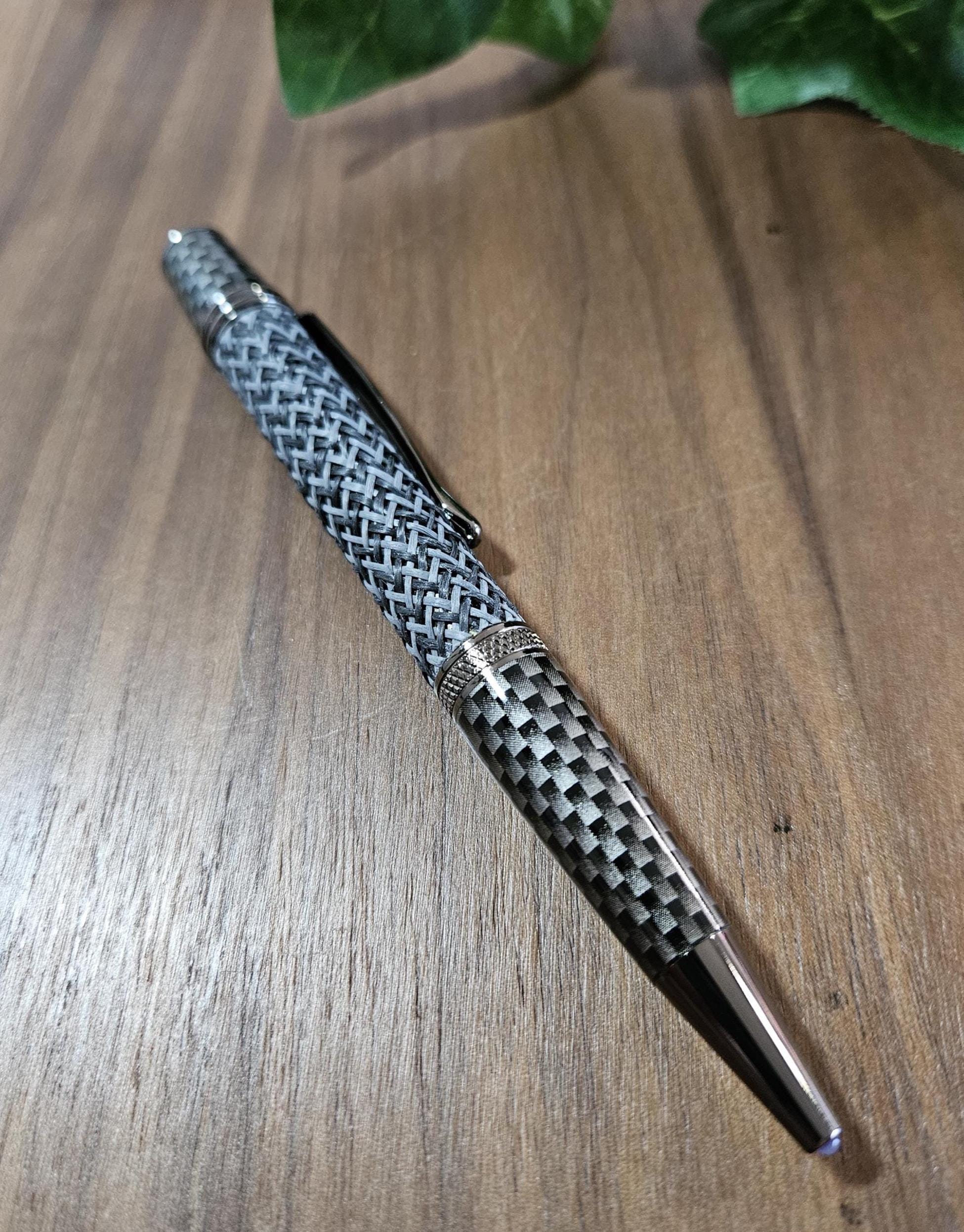 Multi-Colored True Feel Carbon Fiber Twist Pen with Faux Carbon Fiber Finial and Tapered Grip with Gunmetal Accents