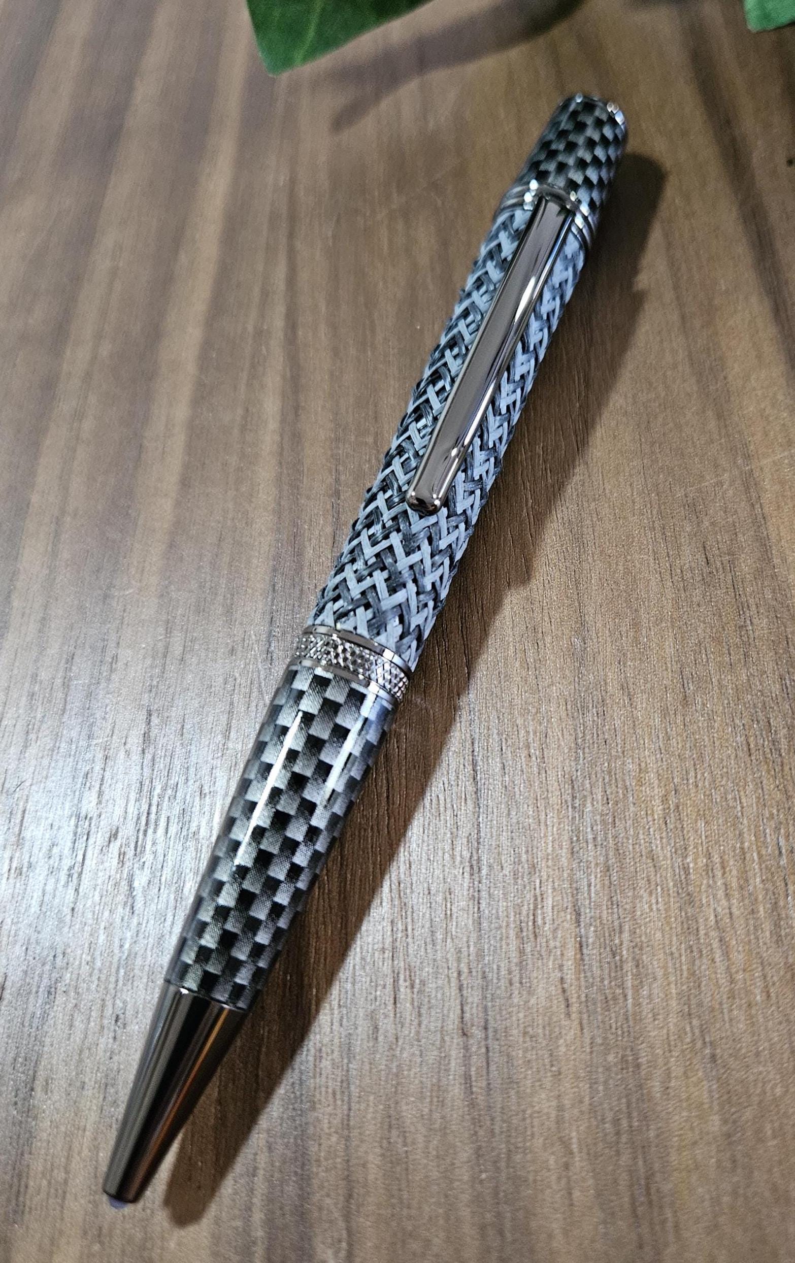 Multi-Colored True Feel Carbon Fiber Twist Pen with Faux Carbon Fiber Finial and Tapered Grip with Gunmetal Accents