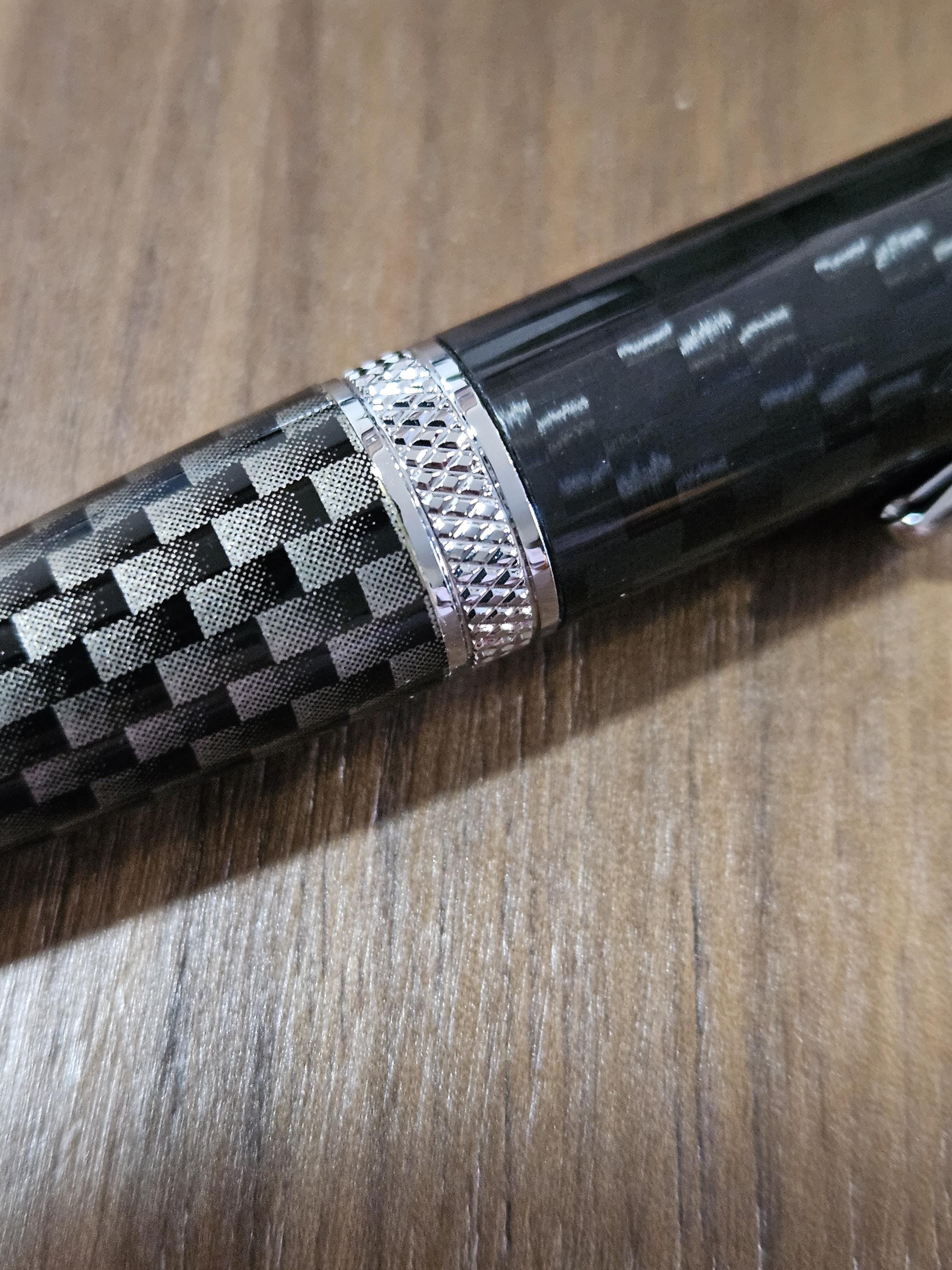 Shades of Black Carbon Fiber Cast in Clear Resin Twist Pen with Faux Carbon Fiber Finial and Tapered Grip with Chrome Accents