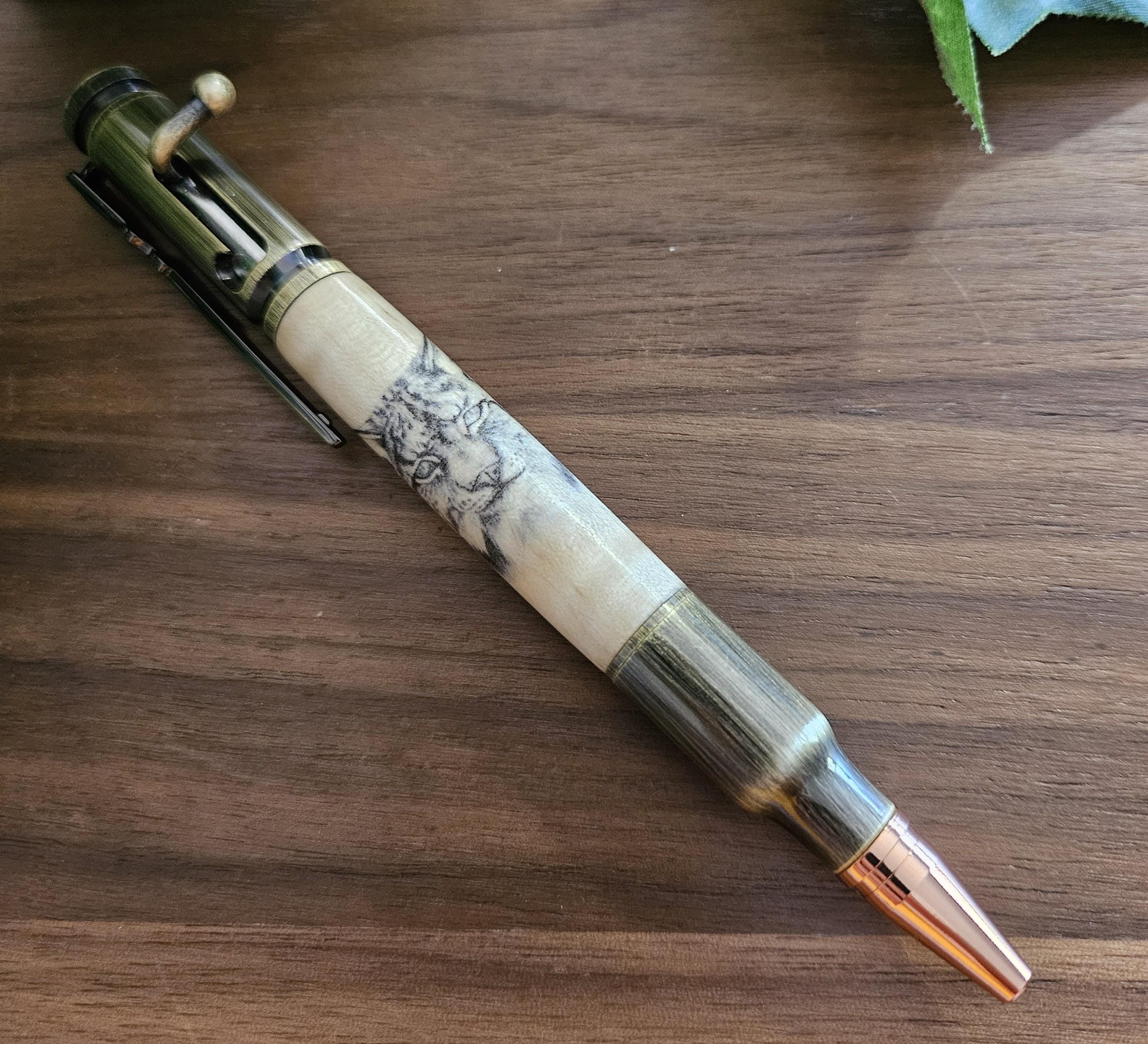 Wooden Bobcat Decal Pen on Curly Maple with a Brushed Antique Brass Bolt Action Rifle Pen Kit