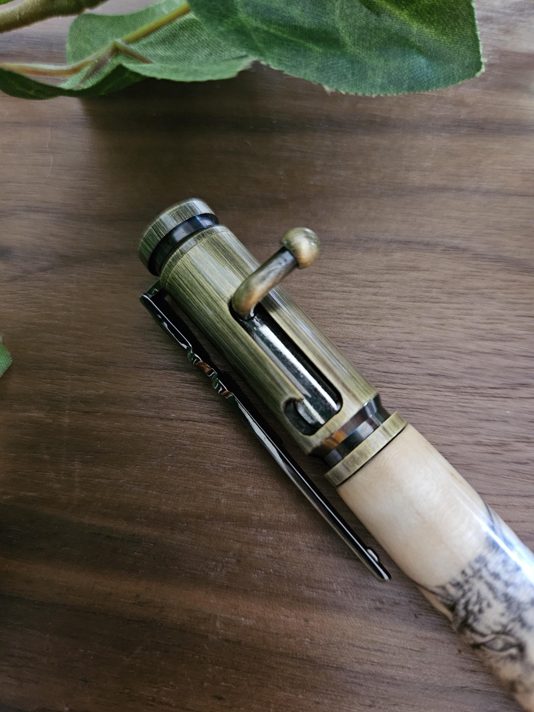 Wooden Bobcat Decal Pen on Curly Maple with a Brushed Antique Brass Bolt Action Rifle Pen Kit