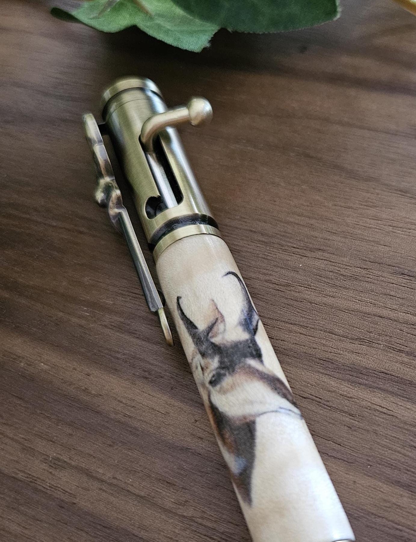 Wooden Pronghorn Deer Head Decal Pen on Curly Maple with an Antique Brass Bolt Action Deer Hunters Pen Kit