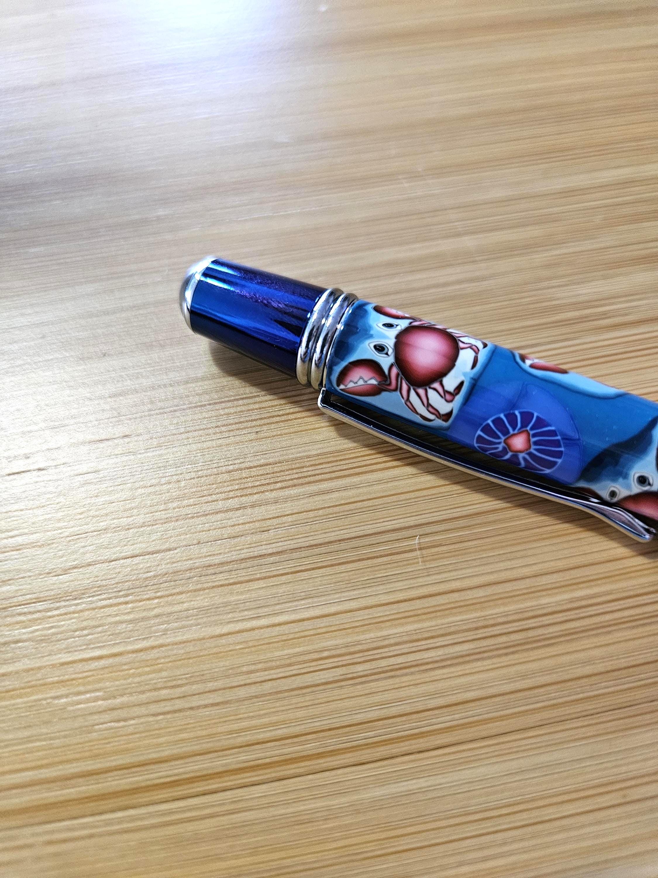 Refillable Polymer Clay Twist Pen, True Texture, Blue Titanium & Chrome Accents, Crab Pattern, Red and Blue Colored Body, Medium Tip, 1.7 oz